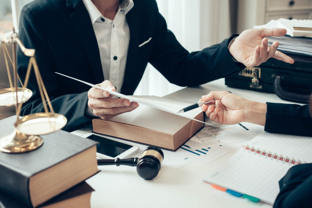Law consultation with documents and gavel.